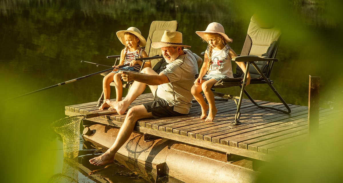 grandpa fishing off a dock with his two granddaughters retirement income oklahoma city ok